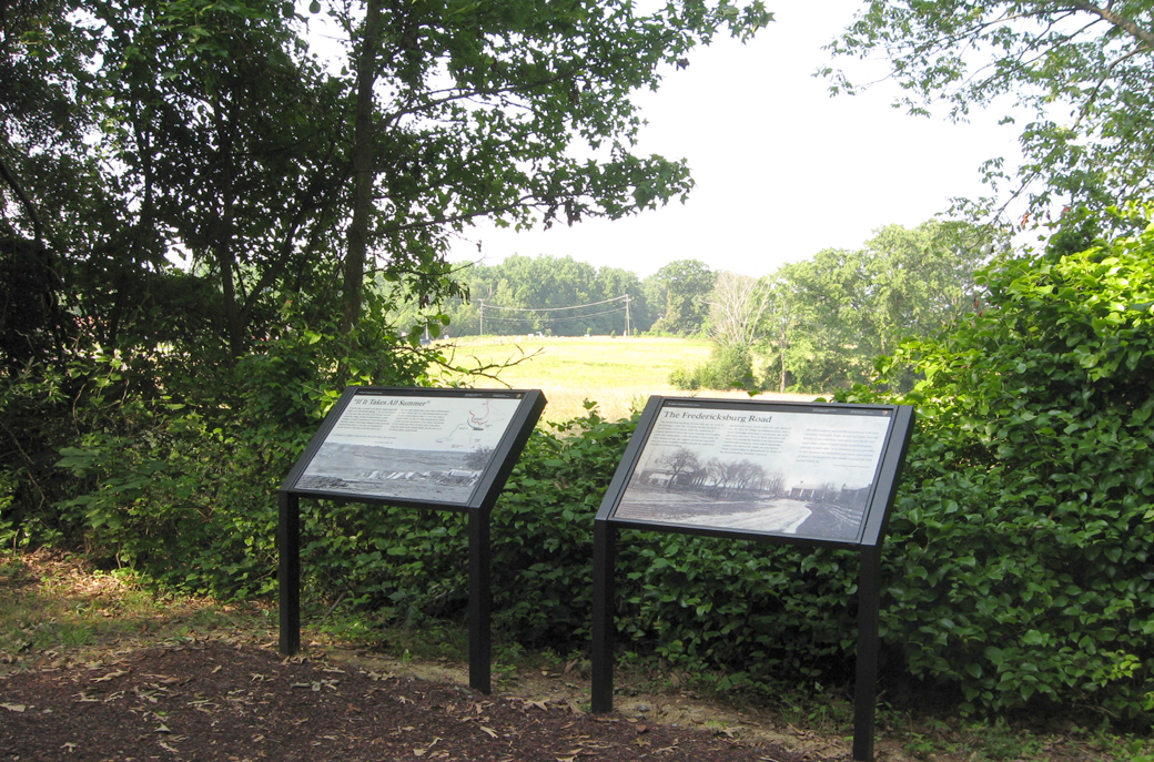 The Fredericksburg Road and If It Takes All Summer wayside markers on the Spotsylvania battlefield
