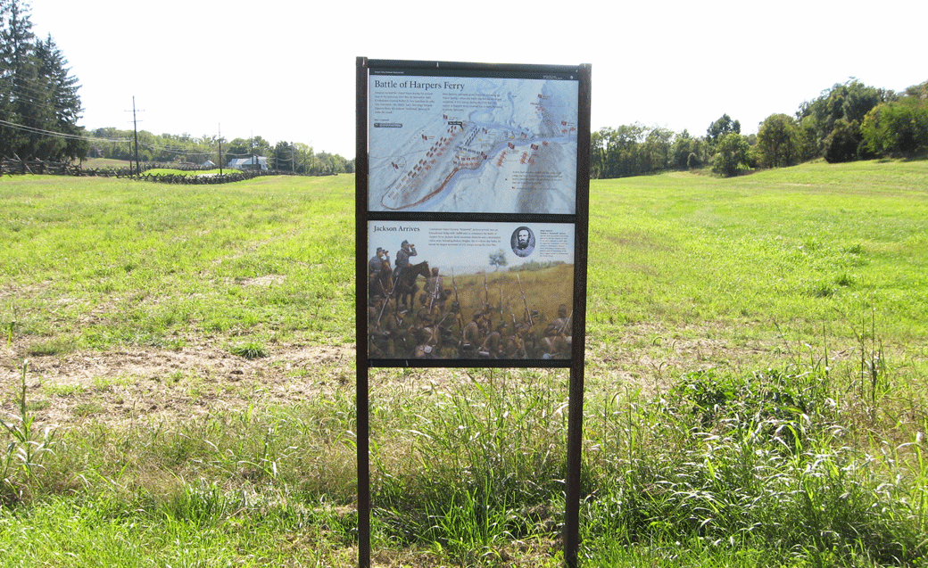 The Jackson Arrives and Battle of Harpers Ferry wayside markers at the foot of North Schoolhouse Ridge on the Harpers Ferry battlefield