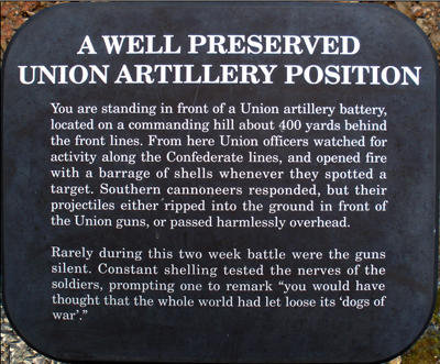 The "A Well Preserved Union Artillery Position" trailside marker is along the mile long hiking trail in Hanover County Park on the Cold Harbor battlefield.