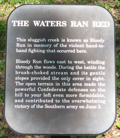 Closeup of The Waters Ran Red trailside marker on the Cold Harbor battlefield