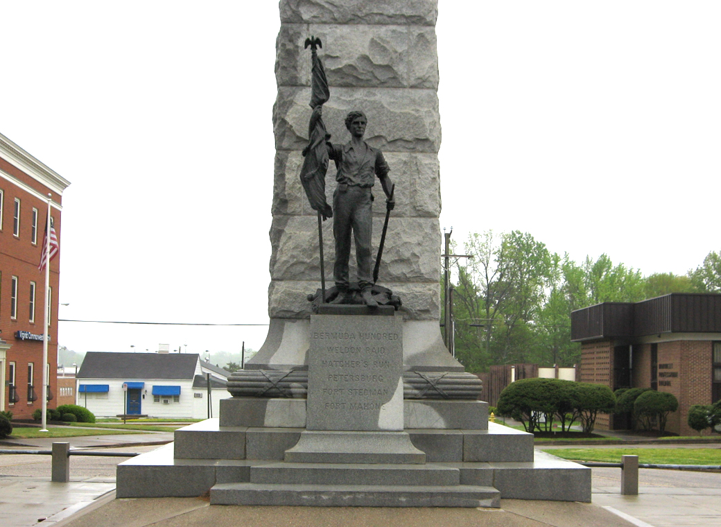 The monument is in an island in the middle of Wakefield street. The "Lincoln in Petersburg" wayside marker is on the west side of the street.
