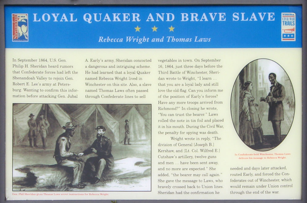 The Loyal Quaker and Brave Slave wayside marker is on the north side of downtown Winchester, Virginia.