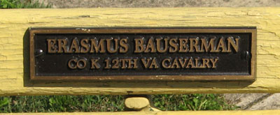 A nearby bench is dedicated to Erasmus Hauserman of Company K, 12th Virginia Cavalry.