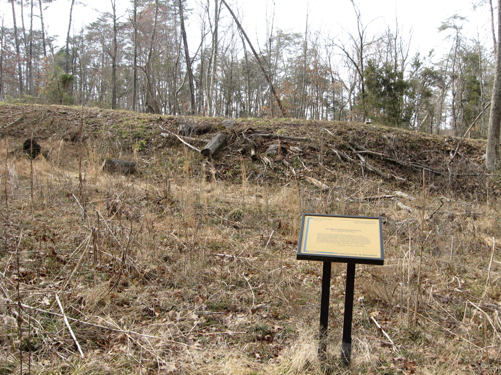The 1st Massachusetts Infantry trailside marker trailside marker is along the Unfinished Railroad, reached from Stop 6 on the Manassas Battlefield Driving Tour.