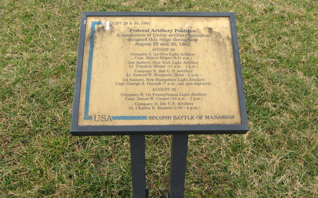 The Federal Artillery Position trailside marker is next to the 14th New York State Militia Regiment near the north end of New York Avenue on the way to Stop 9 of the Manassas Battlefield Driving Tour.