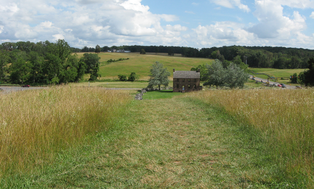 View of the Stone House from Buck Ridge and the Visions of Victory wayside marker