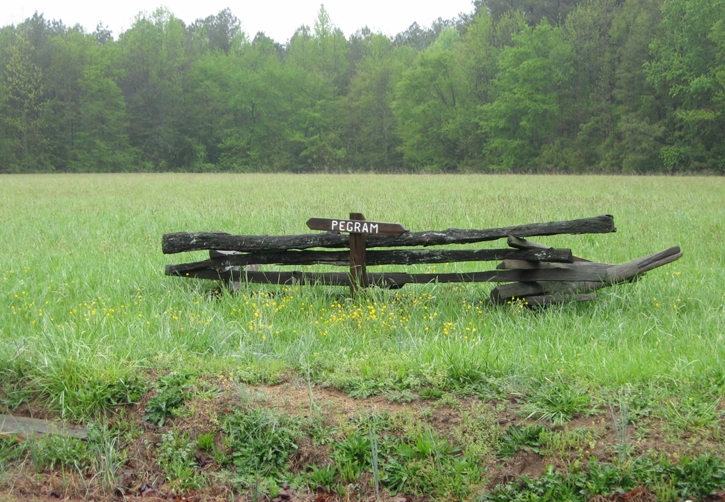 A small wooden marker a short distance away in front of a small set of fence rails shows where Pegram is believed to have fallen.