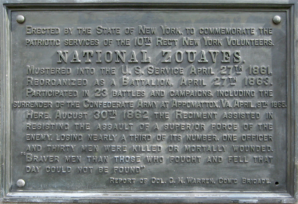 Closeup of the tablet to the Closeup of the top of the Monument to the 10th New York Volunteer Infantry Regiment on the Manassas Battlefield