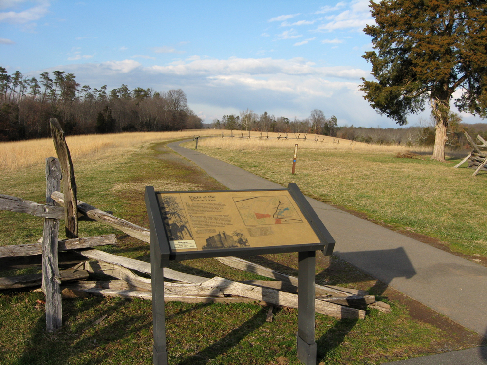 The Fight at the Fence Line wayside marker is at Stop Ten on the Manassas Battlefield Driving Tour.
