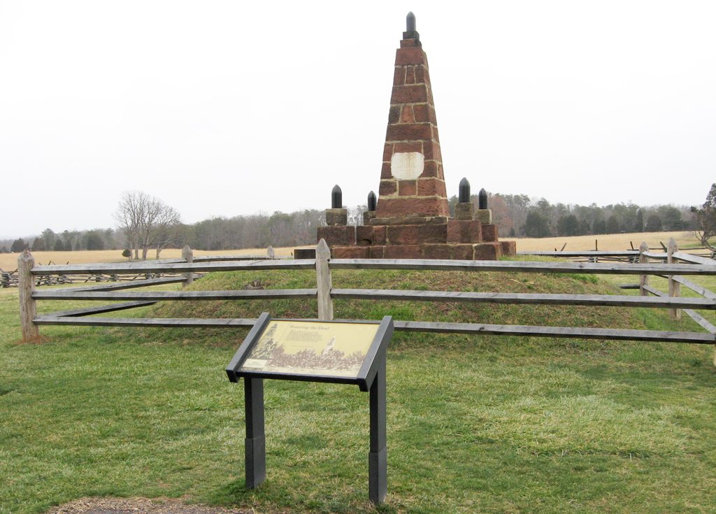 The Honoring the Dead wayside marker is on the Henry Hill walking tour next to the Henry Hill monument.